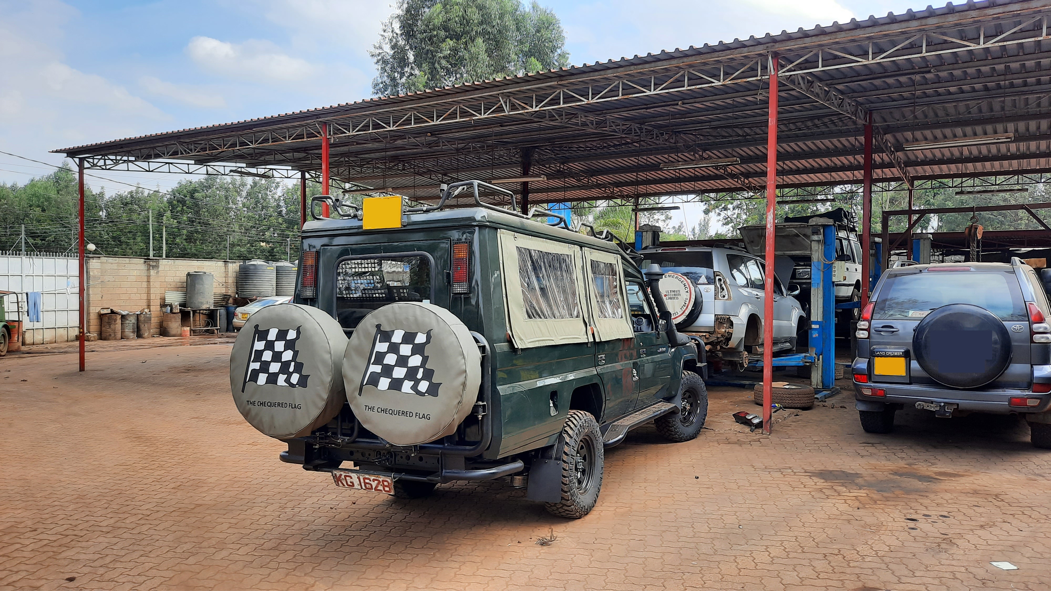 Chequered Flag workshop vehicles